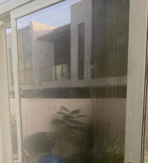 Exterior glass before cleaning
